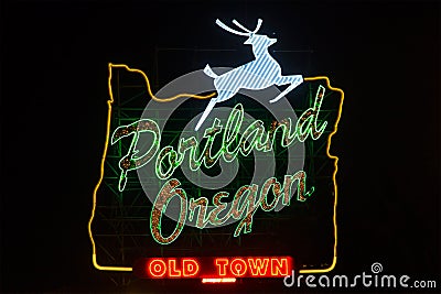 Portland Oregon sign with jumping deer during night Stock Photo