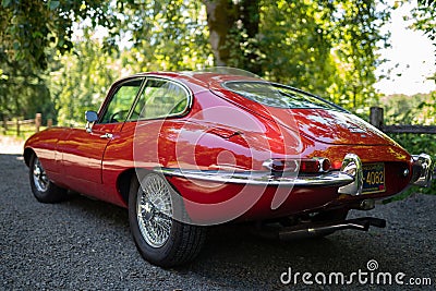 View from behind of vintage red Jaguar car Editorial Stock Photo