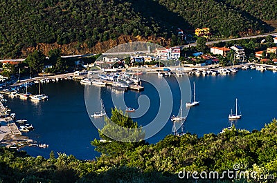 Porto Koufo harbor with a lot of anchored sailboats at sunset, west coast of Sithonia Stock Photo