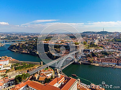 Porto Old Town and Dom Luis Bridge over the Douro river in Porto, Portugal, aerial view. Stock Photo