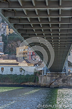 Detailed view under D. Luis bridge structure, Gaia city as background Editorial Stock Photo