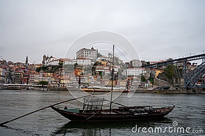 Porto, Portugal, October 31,2020. View from Vila Nova de Gaia on port makers boats and colorful old houses on hill in old part of Editorial Stock Photo