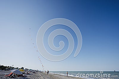 Porto Sant Elpidio, Italy - July 12, 2022: Kite seller in beach Porto Sant Elpidio, Italy Editorial Stock Photo