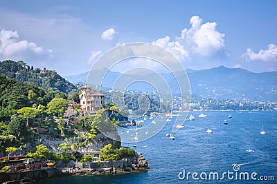 Portofino, Liguria, Italy - aug 09, 2018: Beautiful aerial daylight view from top to boats on water, colorful houses, mountains . Editorial Stock Photo