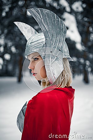 Portrain of woman in image of Germanic-Scandinavian God of thunder and storm. Stock Photo