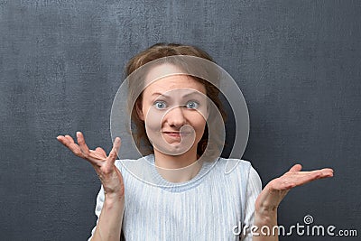 Portrait of abashed girl with uncomprehending expression Stock Photo