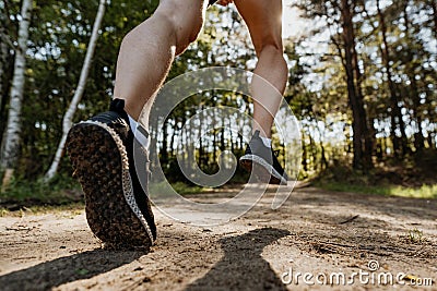 Portrait of active young man running. Morning routine Stock Photo