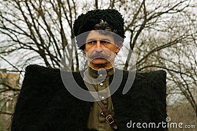 Portrait of actor dressed as cossack of World War II in military-historical reconstruction in Volgograd. Editorial Stock Photo