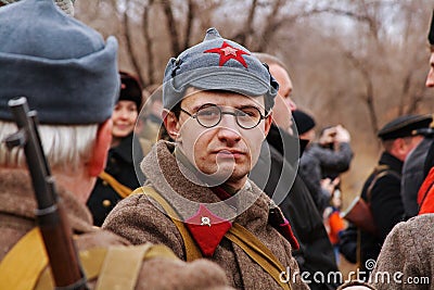 Portrait of actor dressed as Russian Soviet soldier of World War II in military-historical reconstruction in Volgograd. Editorial Stock Photo