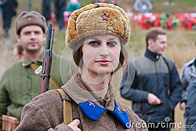 Portrait of actress dressed as russian Soviet soldier of World War II in military-historical reconstruction in Volgograd. Editorial Stock Photo