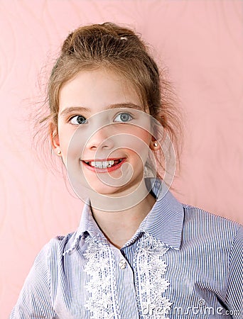 Portrait of adorable smiling little girl child Stock Photo