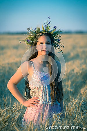 Portrait of young girl at wheat field Stock Photo