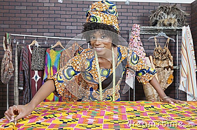 Portrait of an African American female fashion designer working on a pattern cloth Stock Photo