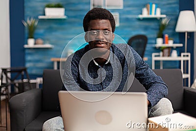 Portrait of african american student working at online management lesson Stock Photo