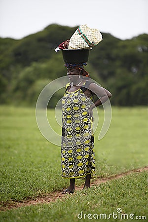 Portrait of an african lady wearing things on her head Editorial Stock Photo