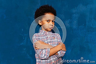 Portrait of afro kid boy hurt or upset offended sensitive. Stock Photo