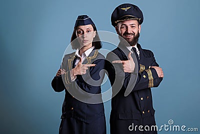 Portrait of airplane capitan and flight attendant Stock Photo