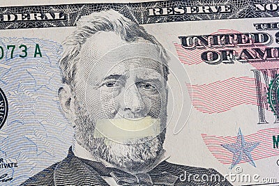 Portrait of the American leader Ulysses Grant with mouth glued on the banknote of fifty dollars USA Stock Photo