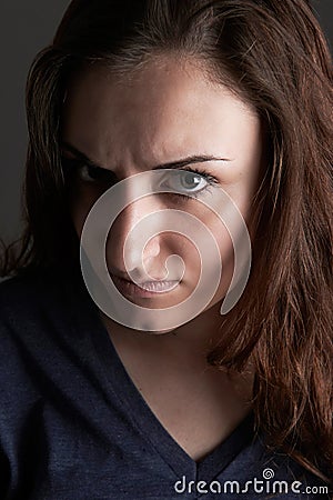 Portrait Of Angry Teenage Girl Stock Photo