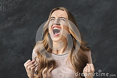 Portrait of angry woman shouting Stock Photo