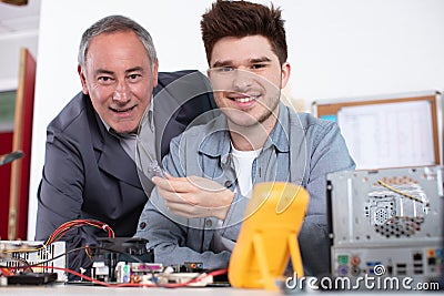 portrait apprentice and mentor with technology Stock Photo