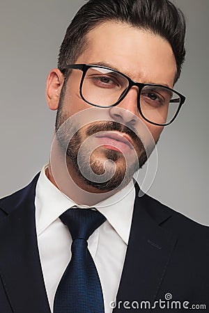 Portrait of arrogant businessman wearing eyeglasses Stock Photo