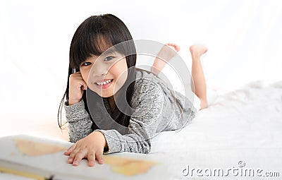 Portrait asia children, education and school concept -student girl reading book. Stock Photo