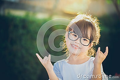 Portrait asia children feeling happy of sunlight. Stock Photo