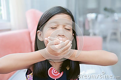 Portrait of asin lazy girl yawning Stock Photo