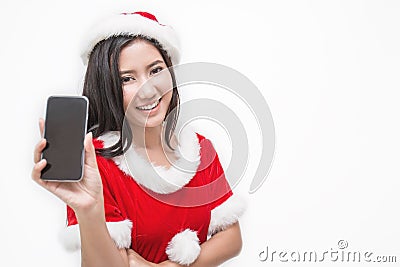 Portrait of asian beautiful woman wearing santa custume with her hand holding mobil phon Stock Photo