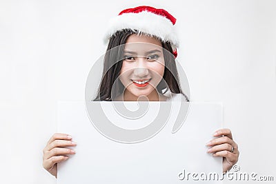 Portrait of asian beautiful woman wearing santa custume holding the paper Stock Photo