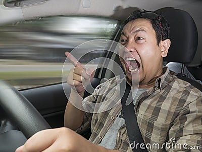 Temperamental Driver Concept, Angry Man Speeding Dangerously Stock Photo