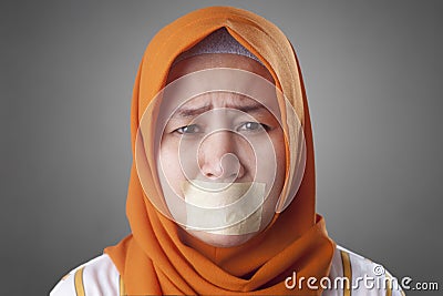 Muslim Lady Crying with Mouth Clossed, Banned for Talking Stock Photo