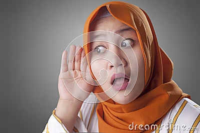 Muslim Lady in Listening Carefully, Hand on Ear Stock Photo