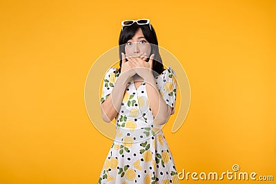 Portrait asian young woman hushing with hand sign shares secret makes taboo gesture wears casual springtime dress isolated on Stock Photo