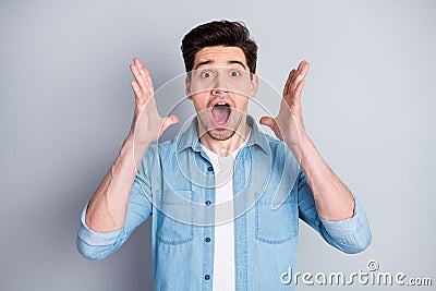 Portrait of astonished crazy nervous anxious guy hear unbelievable covid-19 novelty feel panic start shout wear casual Stock Photo