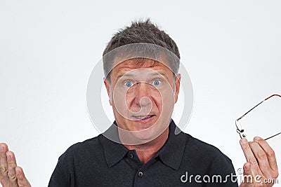 Portrait of astonished senior man in studio Stock Photo