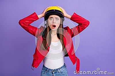 Portrait of astonished worried girl biker have traffic road high speed problem penalty impressed scream touch hands Stock Photo