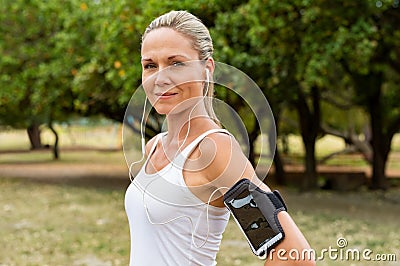 Mature woman jogging Stock Photo