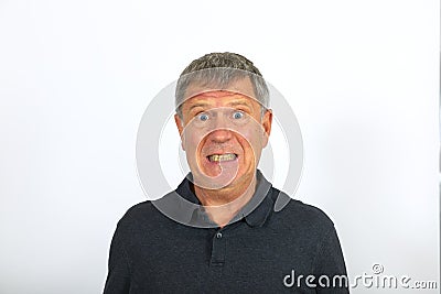 Portrait of attractive angry mature man Stock Photo