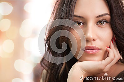 Portrait of attractive brunette girl with lights Stock Photo