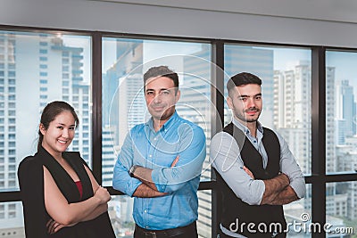 Business People Teams are Standing Beside Windows Frame in Office Workplace, Confident Business Working Teamwork in Arms Crossed P Stock Photo