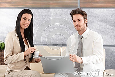 Portrait of attractive businesspeople smiling Stock Photo