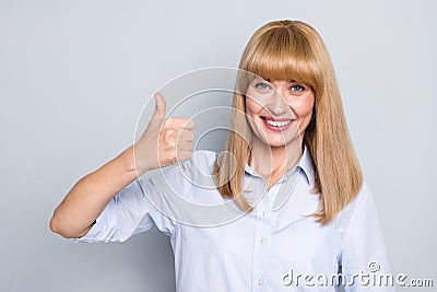 Portrait of attractive cheerful girl employer hr recruiter showing ok-sign ad agree approval isolated over grey pastel Stock Photo