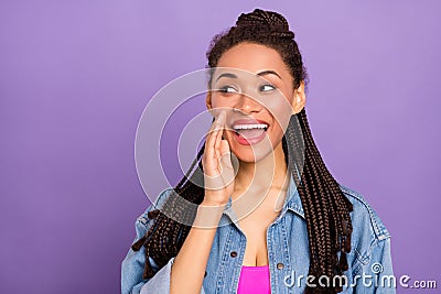 Portrait of attractive cheerful girl saying news advert promo promoter over bright purple violet red color Stock Photo