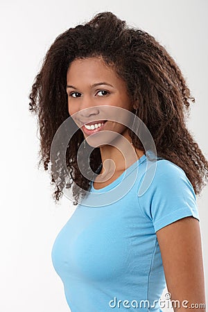 Portrait of attractive ethnic girl smiling Stock Photo