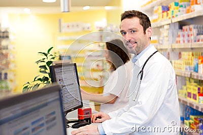 Portrait of an attractive pharmacist team at work Stock Photo
