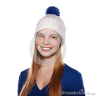 Portrait of attractive smiling girl in winter hat and sweater Stock Photo