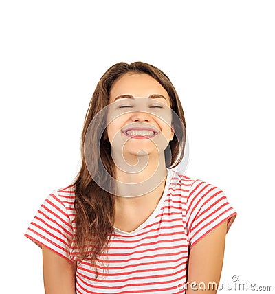 Portrait of an attractive smiling young brunette woman. emotional gloat girl isolated on white background Stock Photo