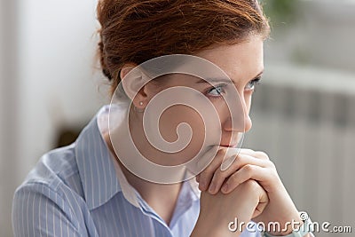 Portrait of attractive thoughtful businesswoman planning, thinking about solving problem Stock Photo